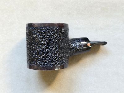 Rusticated magnum, sitting